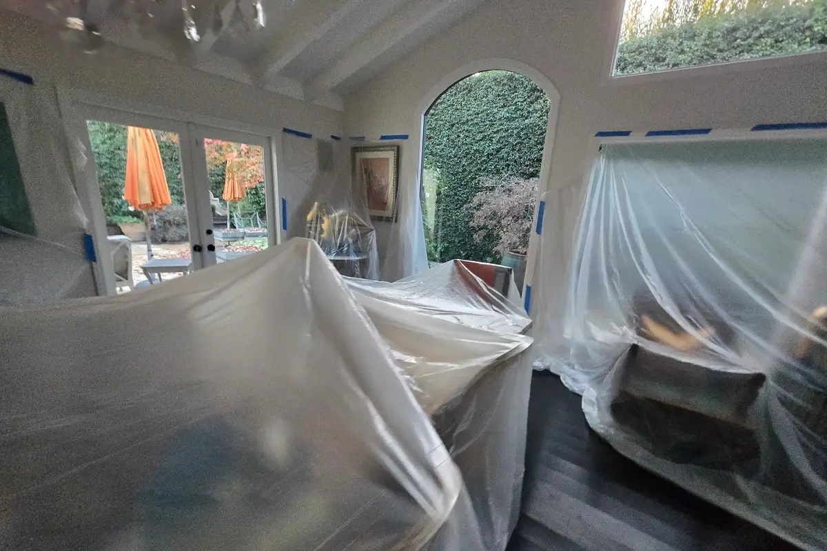 Beverly Hills water damage room with furniture and wall areas protected before mitigation and repair work