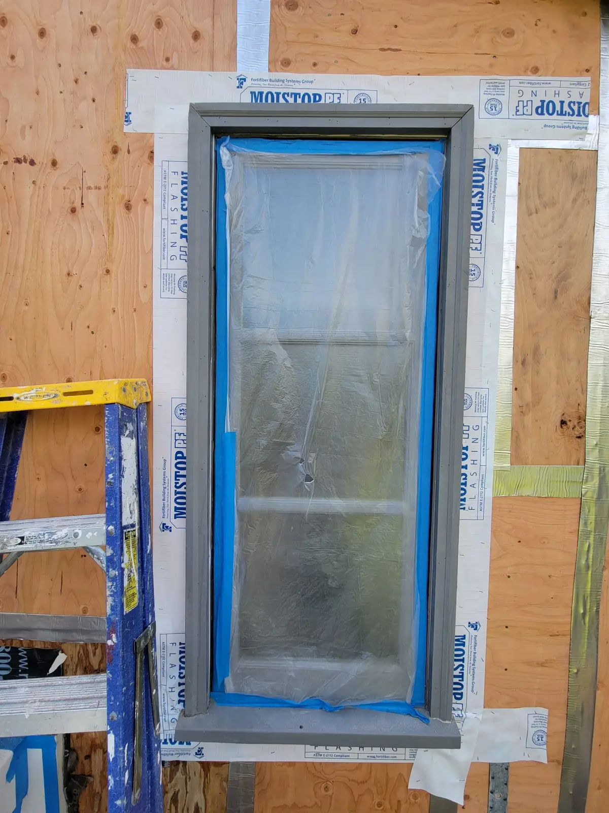 Brentwood window leak exterior wall sheathing opened for water damage inspection