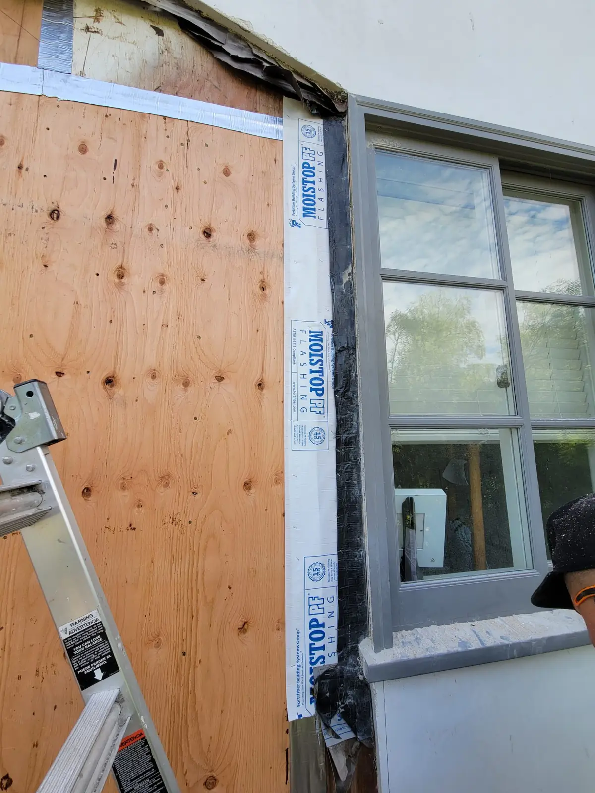 Brentwood window water intrusion waterproofing repair around an exterior wall opening