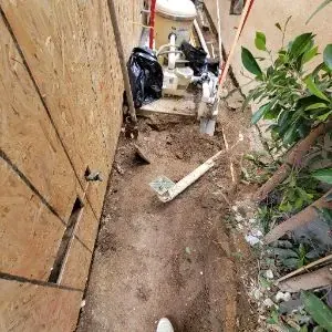 Exterior wall opened for Faircrest Heights water damage demolition and repair