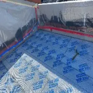Protected roof deck area during Hermosa Beach water damage reconstruction