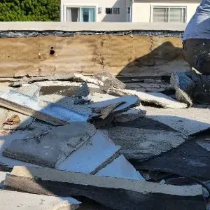 Roof and exterior repair debris during Hermosa Beach water damage work