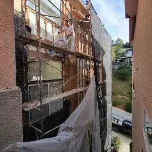 Scaffold access set up for hillside Mount Washington water damage reconstruction