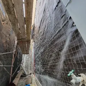Protected exterior wall area during hillside Mount Washington water damage repair