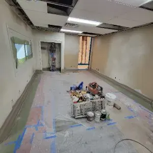 Protected office work area during Vernon commercial water damage repairs